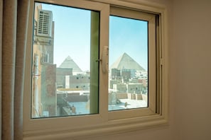 Deluxe Quadruple Room, Mountain View | Free minibar items, individually decorated, individually furnished