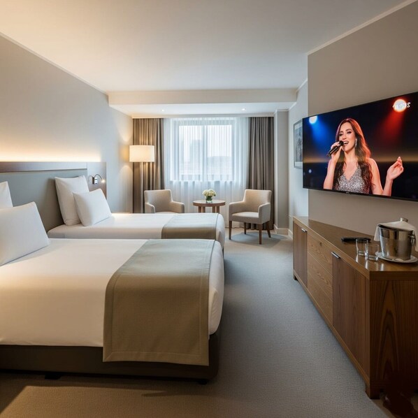 A hotel room with two beds, a TV, a desk, and a window with curtains. - GP PLAZA HOTEL (Baku)