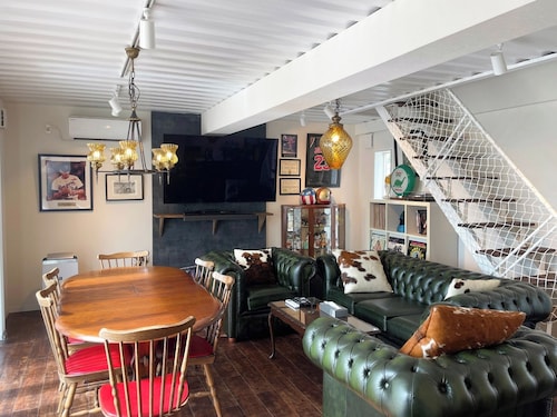 Container Villa B with a sea view accommodates up to 8 people / Oshimagun Kagoshima