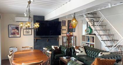 Container Villa B with a sea view accommodates up to 8 people / Oshimagun Kagoshima