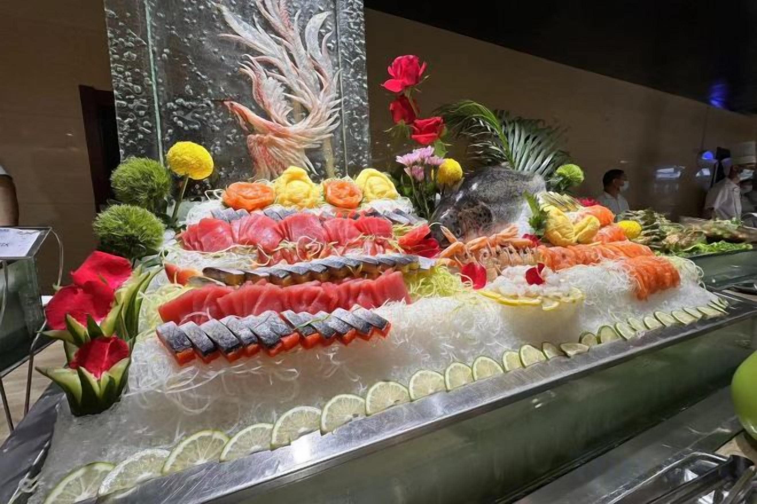 A seafood display with various types of fish and seafood.