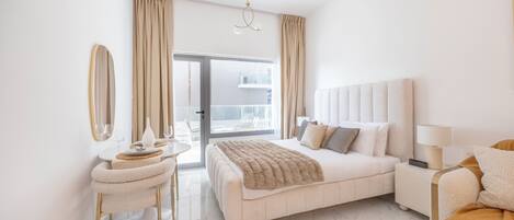 A modern bedroom with a large bed, bedside tables, a mirror, and a view of the outdoors.