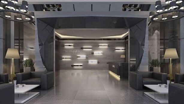 A modern hotel lobby with a reception desk, seating areas, and a large window. - Tsaotun Boutique Hotel (Nantou)
