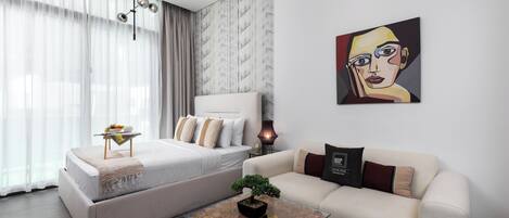 Deluxe studio, niet-roken | Een kluis op de kamer, verduisterende gordijnen, gratis wifi, beddengoed