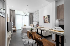Deluxe Studio, Non Smoking | In-room dining - Maison Privee - Serene Studio Escape with Balcony in JVC (Dubai)