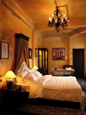 Premium bedding, pillow-top beds, free minibar, desk