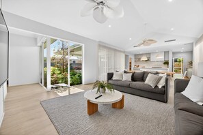 TV, offices - Coastal Luxe 4-Bed House in Madora Bay (Madora Bay)