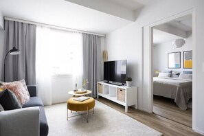 1 bedroom, desk, iron/ironing board, travel crib