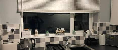 House (Spacious 2BR House with Sofa Bed & Pa) | Private kitchen | Cookware/dishes/utensils