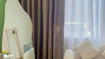 Doppia Deluxe, vista città | Area soggiorno