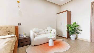 Deluxe dubbelrum - utsikt mot staden | Vardagsrum