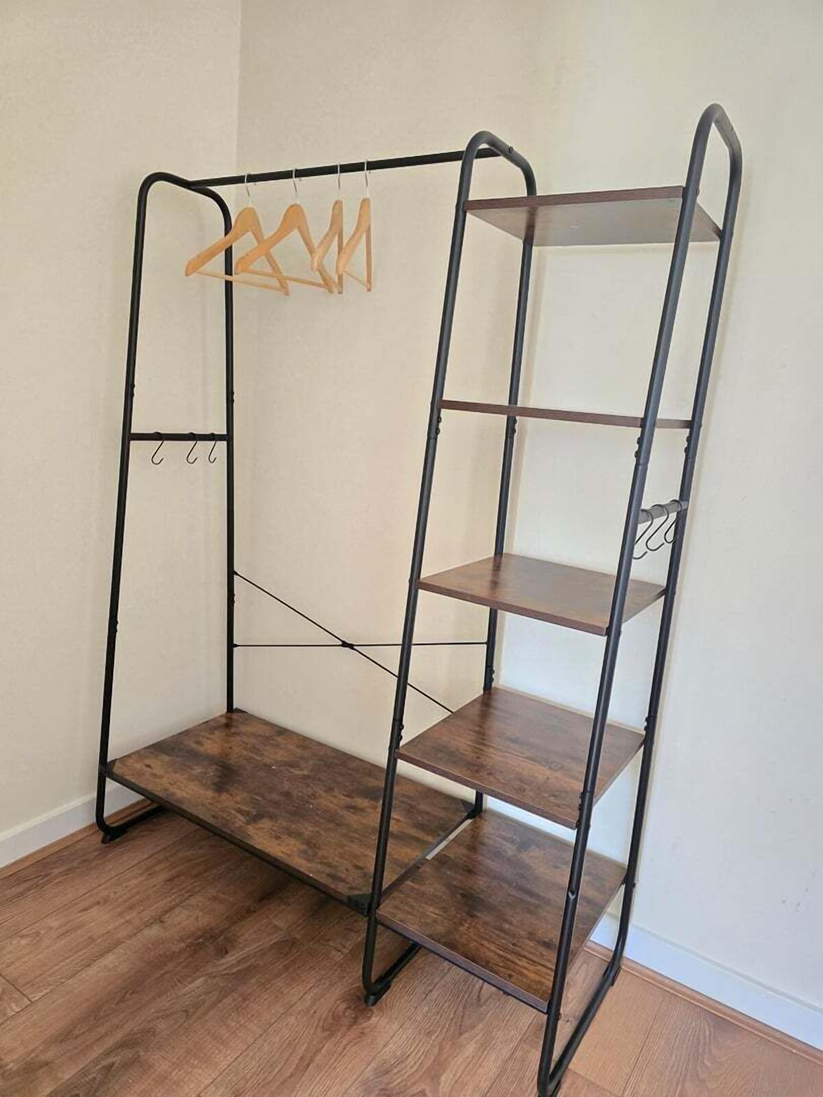 A metal shelving unit with wooden shelves and a hanging rack.