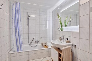 Hair dryer, towels, soap, toilet paper