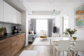 Superior-Apartment, Stadtblick | Wohnbereich