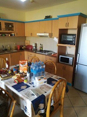 Private kitchen - Charming 1-bedroom apartment in Grand Baie with AC. Close to all facilities! (Grand Bay)