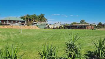 Shared Dormitory, 1 Bedroom, Patio, Garden View | Sport court