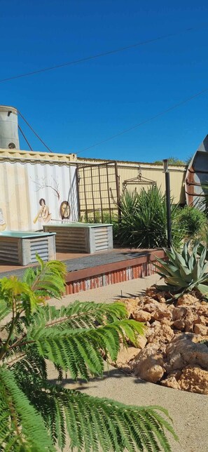 Shared Dormitory, 1 Bedroom, Smoking, Patio | Property grounds