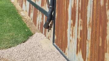 Shared Dormitory, 1 Bedroom, Patio, Garden View | Property grounds