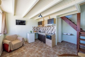 Apartamento, vistas al mar | Zona de estar