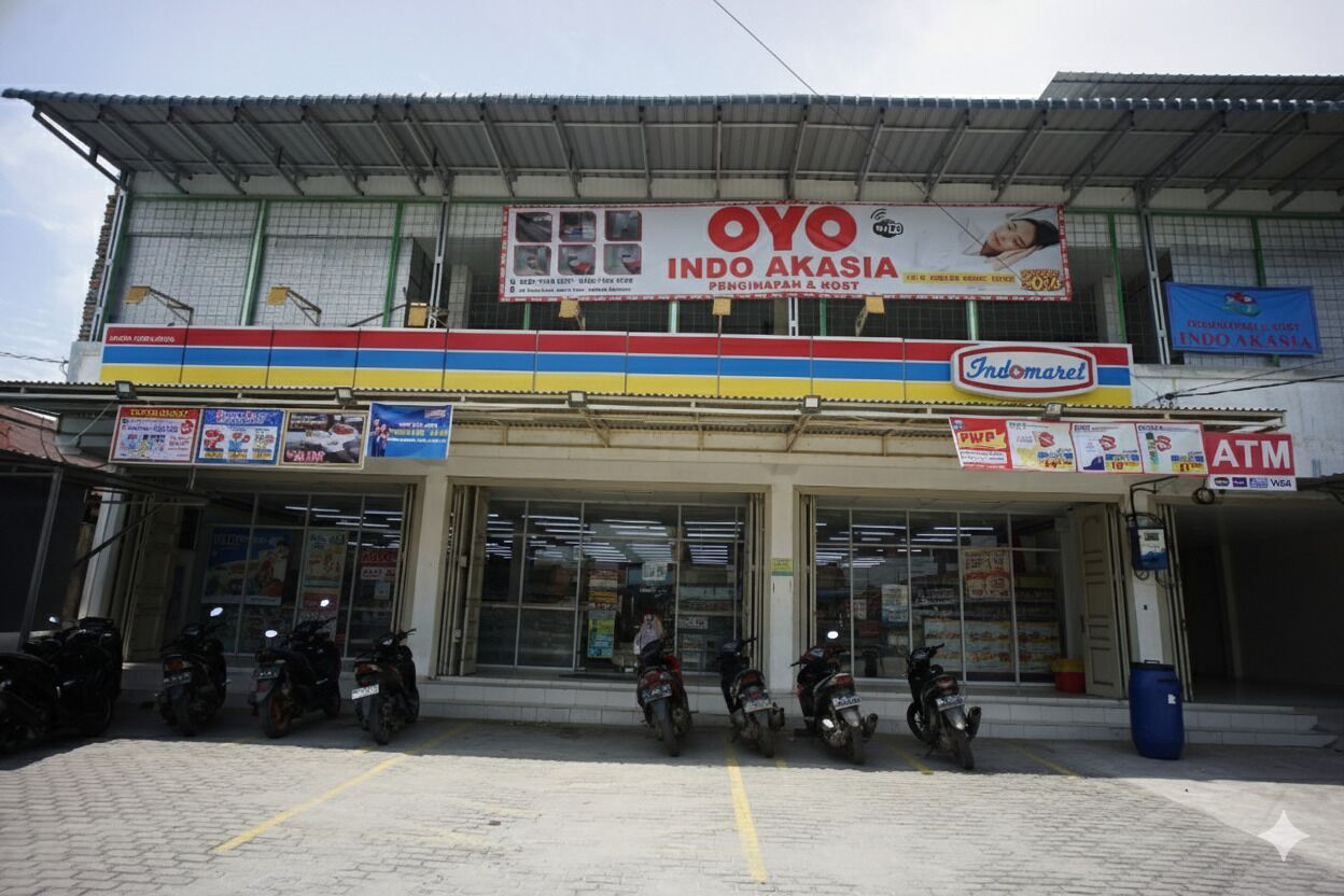 A commercial building with a sign for 'OYO INDO AKASIA' and an 'Indomarel' store.