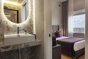 Couette en duvet d'oie, minibar, coffres-forts dans les chambres