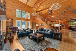 Téléviseur connecté, foyer, table de ping-pong, livres