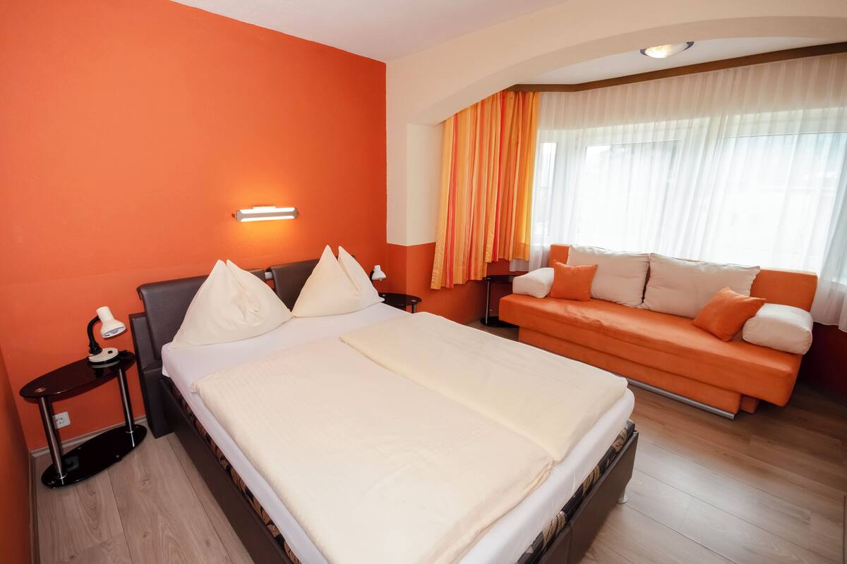 Apartment, Balcony, Courtyard View | In-room safe, blackout drapes, soundproofing, cribs (surcharge)