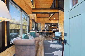 TV, fireplace, table football - Secluded Cabin w/ Hot Tub, Fire Pit, Views (Pigeon Forge)