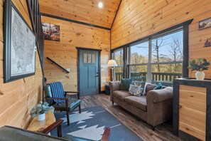 TV, fireplace, table football - Secluded Cabin w/ Hot Tub, Fire Pit, Views (Pigeon Forge)