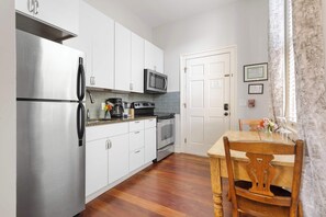 Fridge, microwave, oven, stovetop - The Study | Cozy Apartment w/King Bed + Parking (Charleston)