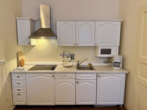 Microondas, placa de cocina