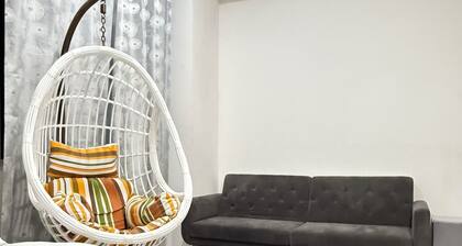 Charming 1-bedroom lodge in wonderful Malé with AC