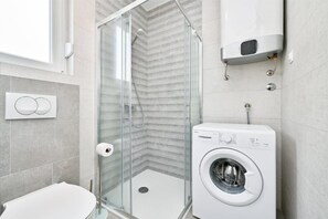 Shower, hair dryer, towels, toilet paper - One-bedroom Apartment with Balcony - C1 Infinity (Novalja)