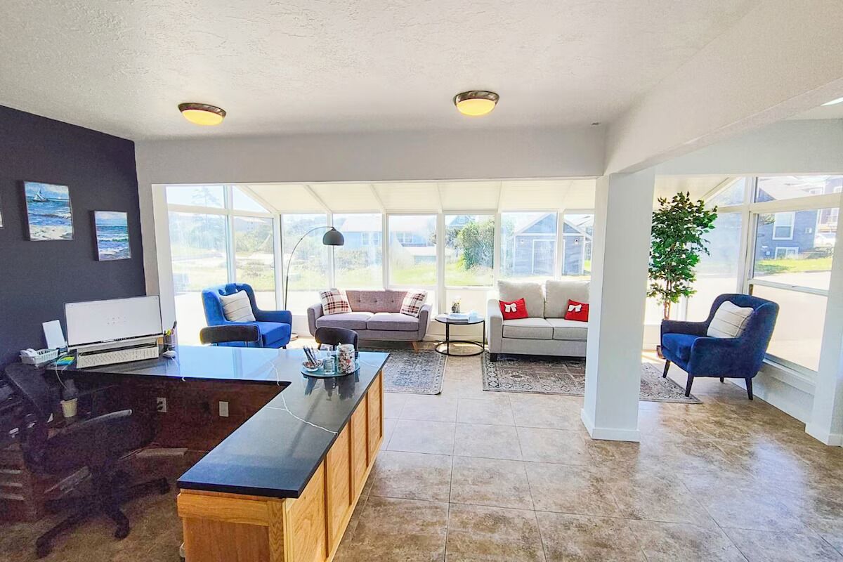 Settle in with sunlit seating and relaxed coastal comfort.