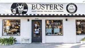 A storefront with the name 'Buster's' and a sign indicating it sells vintage furniture, home decor, and offers paint workshops. - Grand Central Kava Loft Walk to Vibes (St. Petersburg)