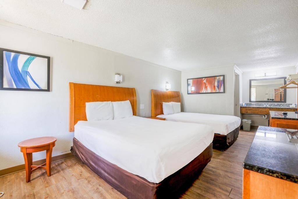 Unwind in a spacious room with two comfy beds.
