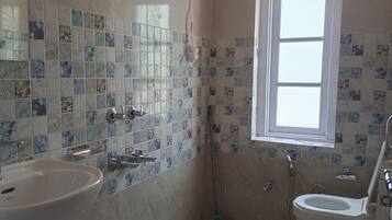 Shower, eco-friendly toiletries, towels, soap