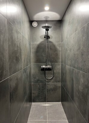 Shower, towels, soap, toilet paper