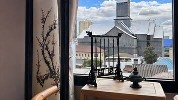 Desk, laptop workspace, blackout curtains, soundproofing