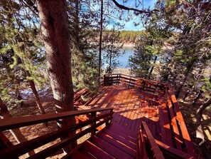 Terrace/patio - LAKESIDE BRIMWATER: Henrys Fork Private Beach Dock Fishing Yellowstone UTV Snowmobile Trails (Island Park)