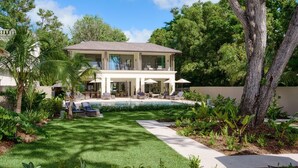 A two-story house with a swimming pool, surrounded by lush greenery and palm trees. - Sea Grove House 5 Bedroom Villa (Weston)