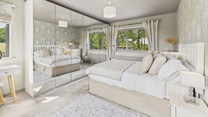 A bedroom with a large bed, a mirror, a window with curtains, and a radiator.