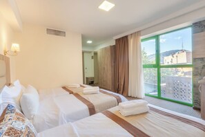 Standard Triple Room | Iron/ironing board, free WiFi