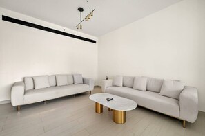 Living area - FIRST CLASS Stylish 2BR | Sparkling Pool View (JVC)