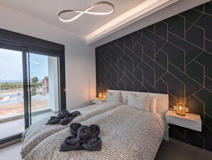 3 habitaciones, tabla de planchar con plancha, wifi y ropa de cama