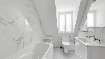Shower, free toiletries, hair dryer, towels