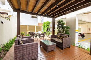 Apartamento Confort | Restaurante al aire libre