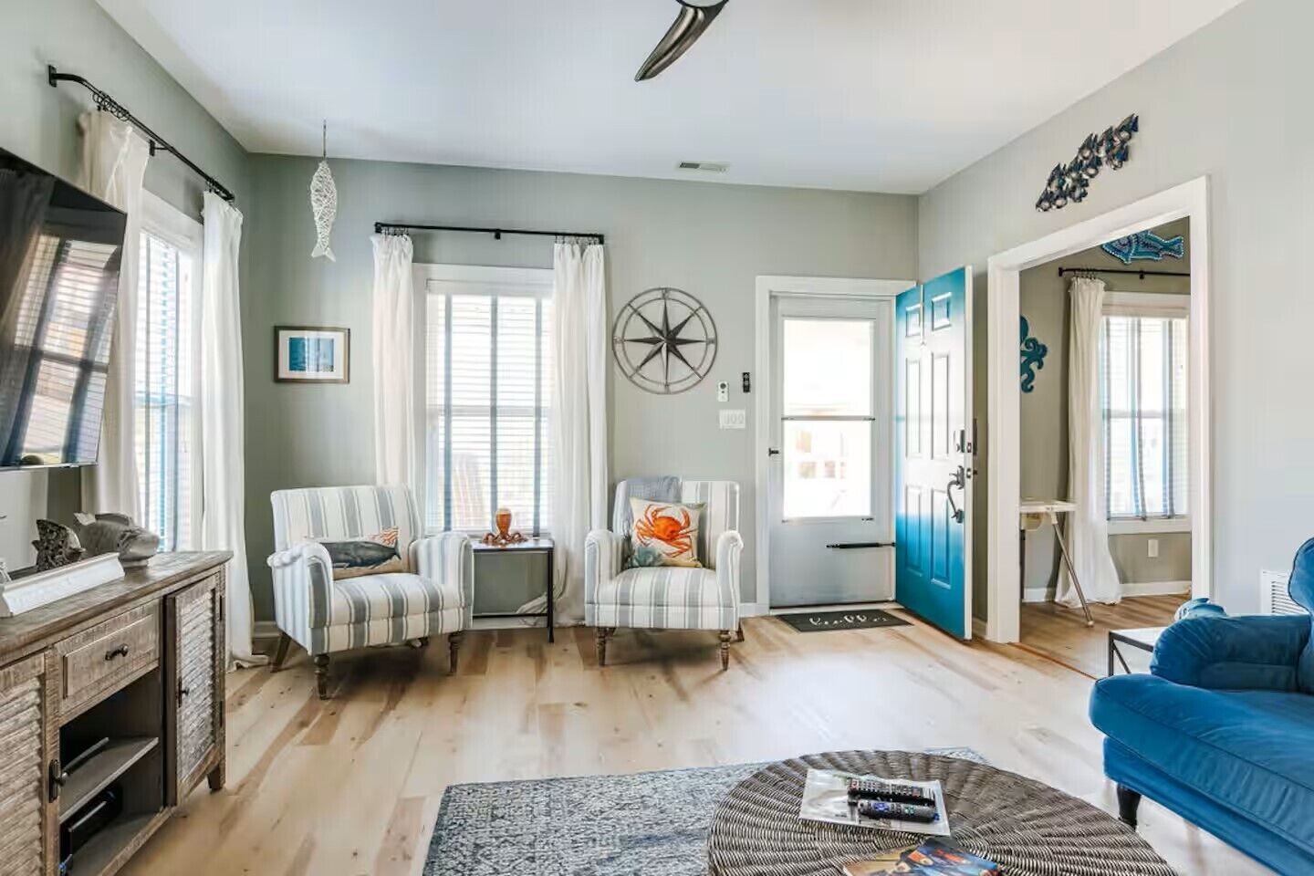 Smart TV, fireplace, books, computer monitors