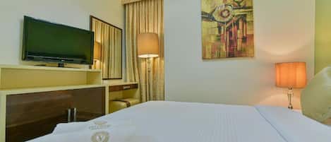 Desk, laptop workspace, blackout drapes, soundproofing