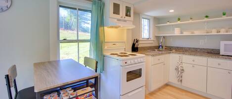 Fridge, microwave, stovetop, coffee/tea maker